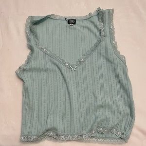 Cute, lightweight, and lacy tank top. Perfect for hot summer days.